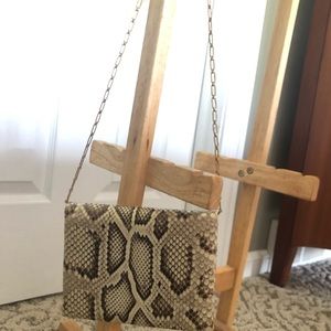 Snakeskin vintage purse, with gold link chain.